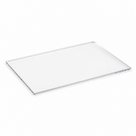 Clear PETG panel lying corner-on against white, polished edges and the sheet's section catching the light