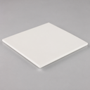 White PET sheet, angled studio shot on a grey background