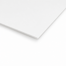 Crisp corner of a thin white cladding panel on white, its narrow edge just catching a shadow