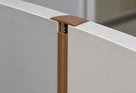 Illustrative use case of teak-coloured 19mm rigid PVC barbed T section installed between panels