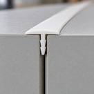 Illustrative use case of white 19mm rigid PVC barbed T section installed between panels