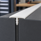 Illustrative use case of white rigid PVC barbed T section installed between panels