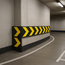Reflective chevron wall guards on car park corner wall - multiple units directing traffic around tight turn