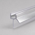 Studio shot of the chrome shower screen seal profile - clear PVC U-channel with brushed chrome strip on the angled deflector