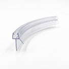 Clear pre-curved seal on white, gentle arc with a hooked channel and long blade at the near end