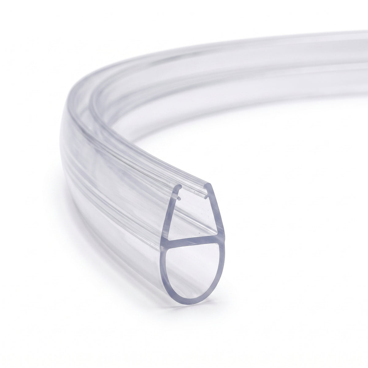 Clear seal coiled into a ring on white, cut end forward showing the glass channel above a hollow teardrop bubble