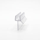 Clear seal offcut on white, glass channel with a broad side fin and a long thin drop blade