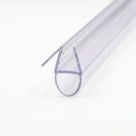 Clear seal on white receding from its cut end, angled rigid fin beside the channel above a large hollow round bubble