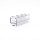Cut length of clear PVC shower seal on white, angled view - glass channel with a small round bubble loop below