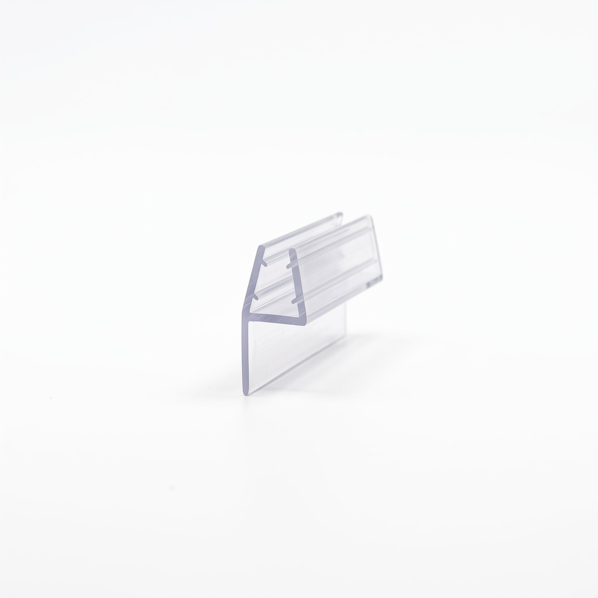 Cut length of SEAL058 clear seal - trapezoid channel for 10-12mm glass with single 15mm straight blade