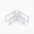 Clear corner seal offcut on white, two glass channels meeting at a right angle to form a V