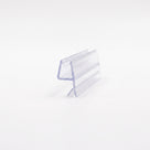 Clear seal offcut on white, angled - glass channel with a rigid angled blade and a soft lower fin