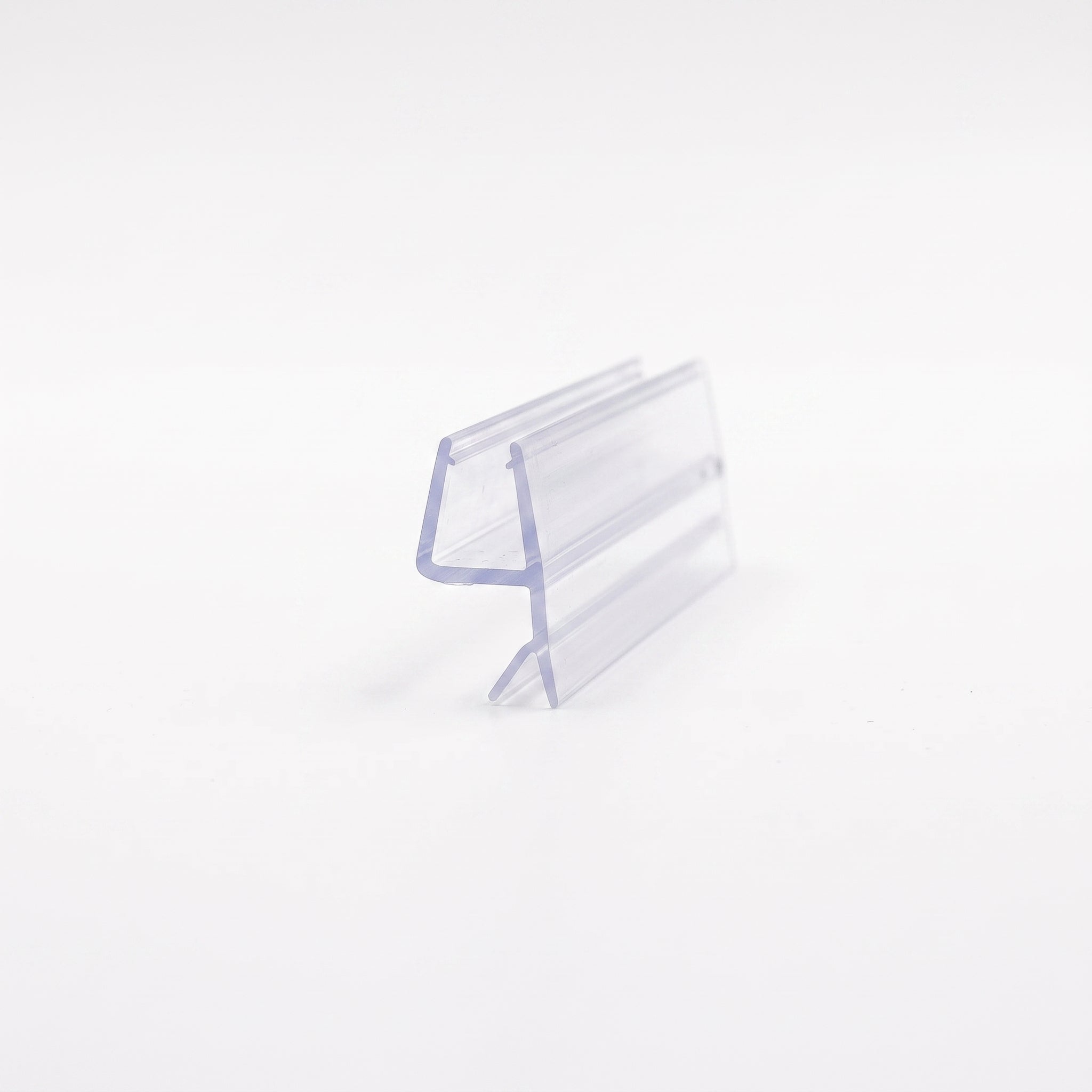 Cut length of SEAL068 clear seal - channel for 4-6mm glass with rigid 11mm angled blade and 6mm soft fin