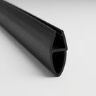Length of black shower seal on white, glass channel above a tall oval hollow bubble