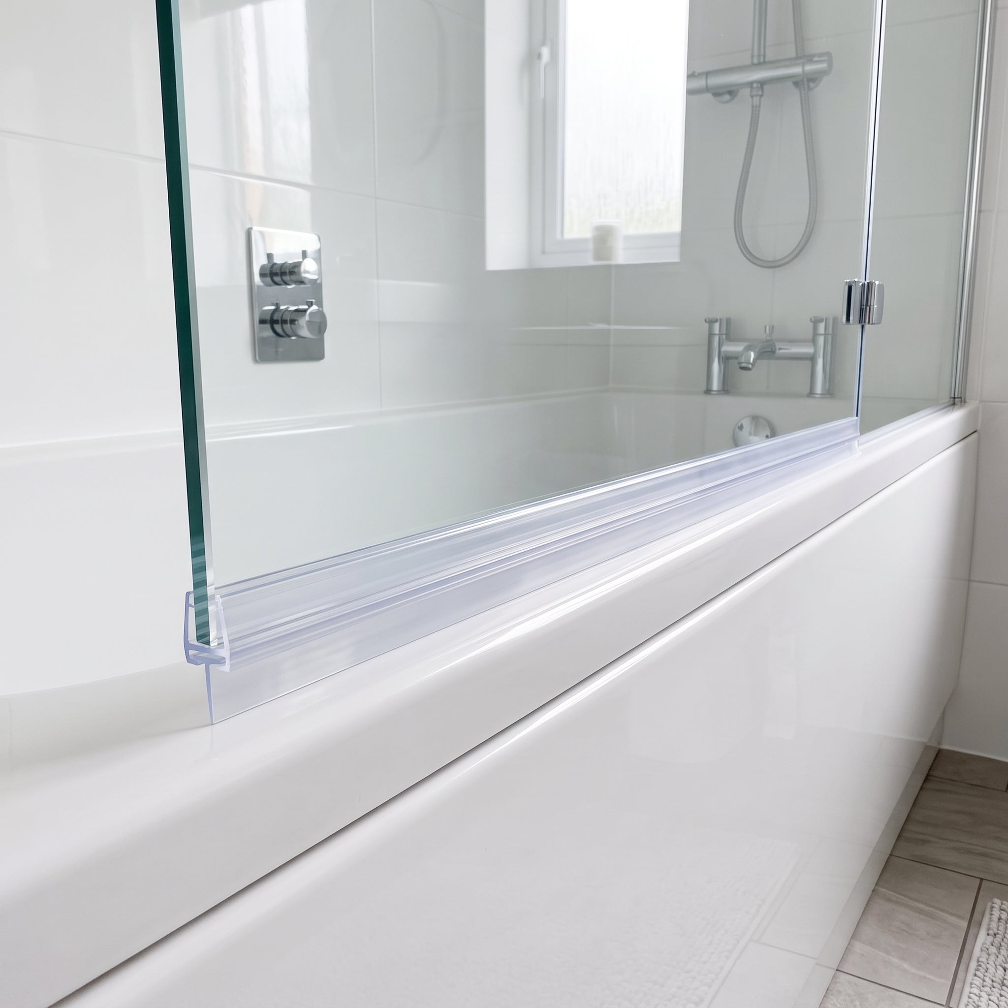 SEAL084T tapered seal fitted horizontally along 8mm glass with the deep end of the blade over the widest gap