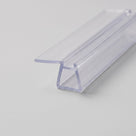 Length of clear seal on white, glass channel with a soft fin off the top of one channel wall