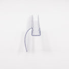Clear seal offcut on white, glass channel with a curved blade sweeping down from one side