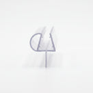 Clear seal offcut end-on on white, glass channel with a D-shaped side bubble and a drop blade