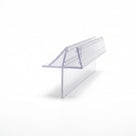 Clear seal offcut on white, glass channel with an angled wing fin above a flat lower blade
