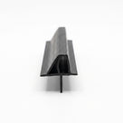 Length of black shower seal on white, channel with an upper wing fin and a lower drop blade