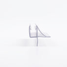 Clear seal offcut on white, end-on: glass channel with a swept curved fin and a straight lower fin