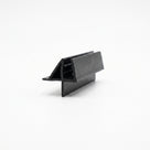 Short black seal offcut on white, glass channel between a triangular deflector and a flat lower fin