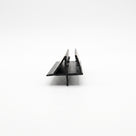 Black seal offcut end-on on white, channel with a sloping wing and a short drop fin
