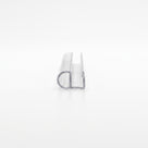 Clear seal offcut end-on on white, glass channel beside a large hollow D-shaped bubble