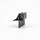 Black seal offcut on white, channel with a sweeping upper wing and a long curved lower fin