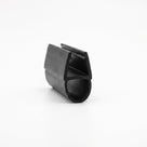 Black rubber seal offcut on white, glass channel above a rounded hollow bulb