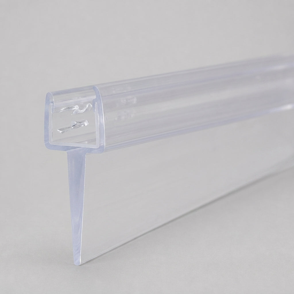 Studio shot of the tapered shower seal profile - clear PVC U-channel with fin tapering from 10mm to 5mm along its 900mm length