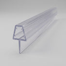Clear PVC tapered seal profile angled on pale grey, trapezoid channel above a stem and sloping fin