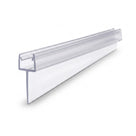 Short section of clear tapered seal on white, ribbed channel above a broad sloping fin