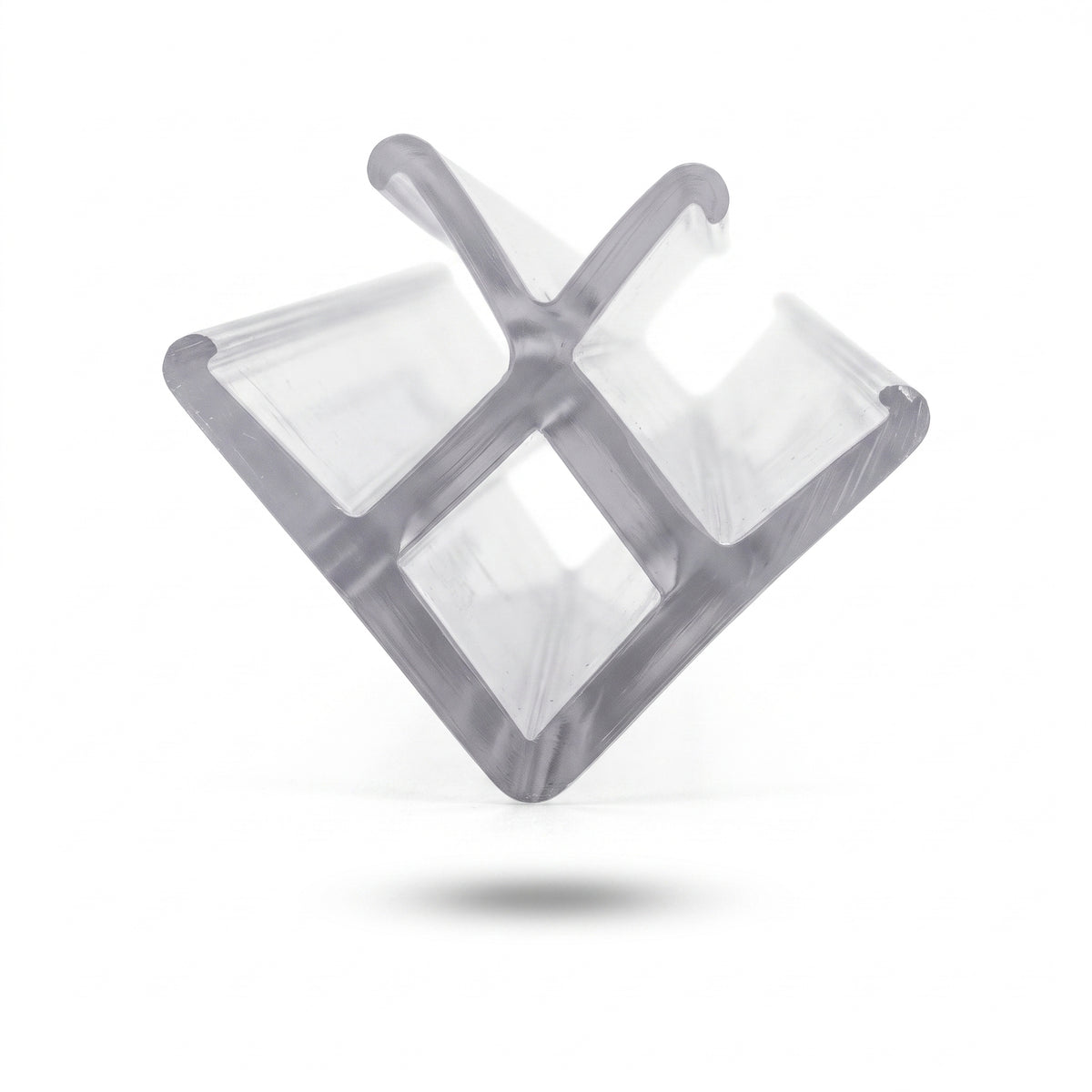 Clear corner seal offcut on white, two glass channels meeting at a right angle around a hollow square core