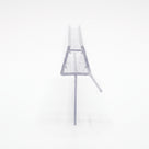 Clear seal offcut end-on on white, trapezoid glass channel with an angled fin and a long drop fin