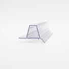 Clear seal offcut on white, glass channel between a flat lower fin and an angled second fin