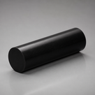 Short black UHMWPE rod on a pale grey studio surface, matt round end face towards the left