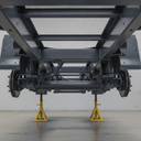 Vehicle chassis freshly painted dark grey underbody protective coating in UK workshop